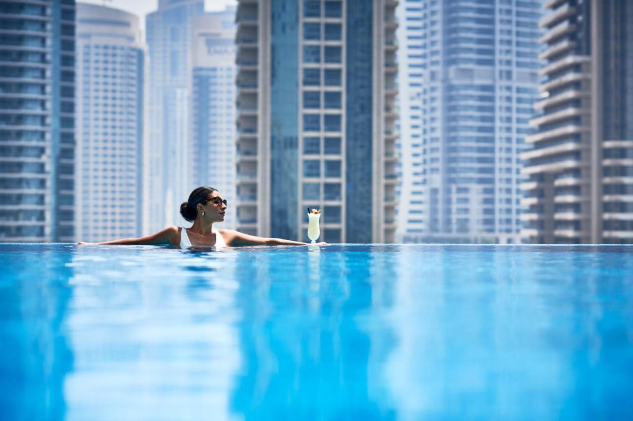 Jumeirah Living Marina Gate Dubai Aparthotel Exterior photo The swimming pool at the Address Downtown Hotel